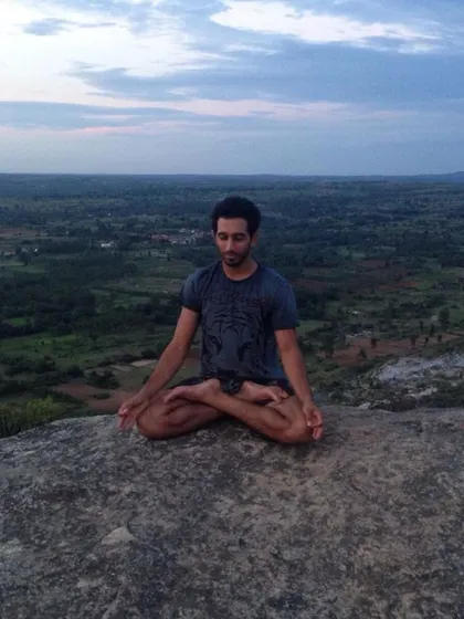 Finding a moment of peace and meditation on a mountaintop. Balance isn't just physical; it's mental and emotional too.