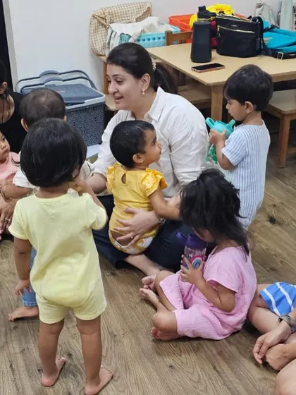 Children often love to sit close and feel connected during our songs. This is a space where they feel secure and cherished, which allows them to participate more fully.