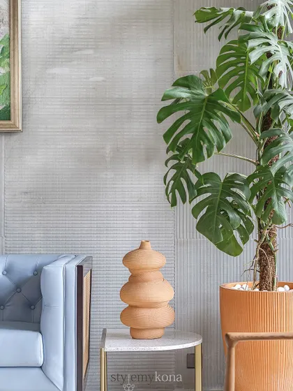 Artifacts bring soul to a space. I loved styling this corner with a terracotta vase and a large planter, mixing textures to create a layered, interesting look.
