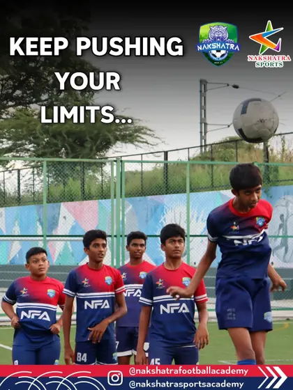 Keep pushing your limits. A player practices his heading technique while his teammates look on, ready for their turn.