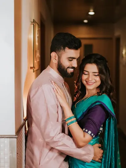Another beautiful shot of the couple. The bride's makeup is fresh and glowing, perfect for their engagement photos.