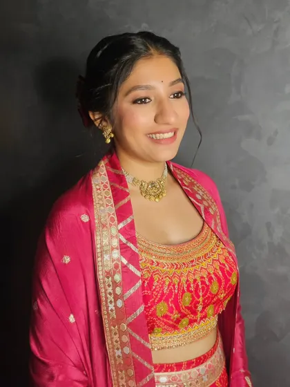 Labdhi's joyful smile is the best feedback a makeup artist can ask for.