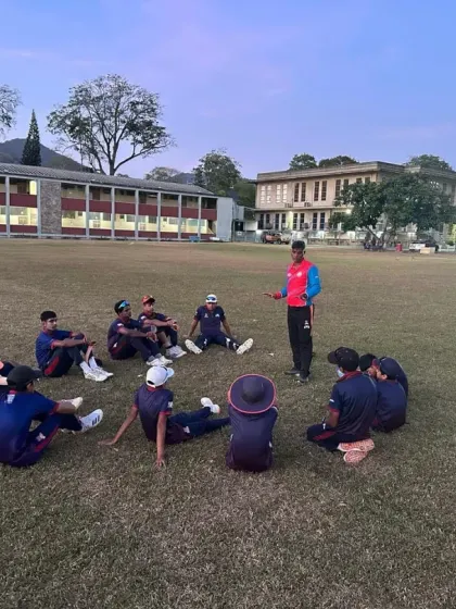 A debrief session with the coach after a match in Trinidad. These international tours are a fantastic learning curve for our players.