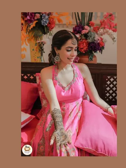 A beautiful portrait of the bride showing her intricate mehndi design.