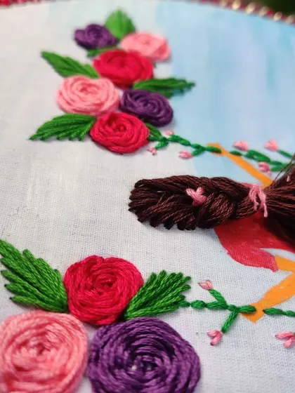 A detail shot focusing on the texture of the thread in the embroidery.