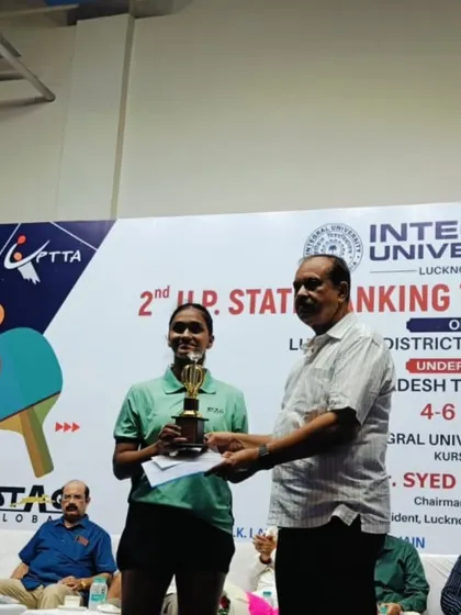 Suhani Agarwal accepting her Bronze Medal in the U-17 Girls category at the UP State Ranking Tournament. Her consistent performance secured her a spot on the podium.