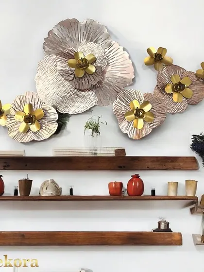 This floral wall sculpture uses a soft, muted color palette to create a sense of calm and sophistication.