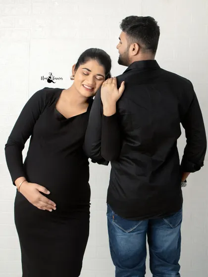 She rests her head on his shoulder, a picture of peace and trust. These casual studio portraits are all about capturing genuine emotion and connection.