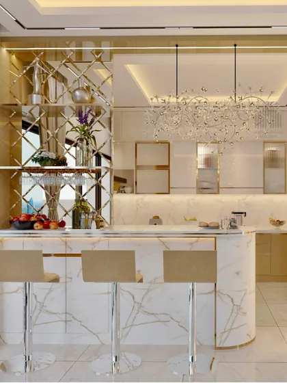 A closer look at a glamorous bar and kitchen area from a 3D render. The design features a marble-clad breakfast bar, a mirrored bar unit, and a spectacular chandelier, epitomizing luxury.