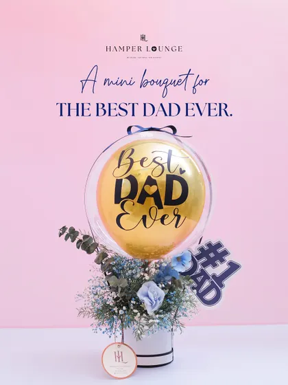 A mini bouquet for the best dad ever. This charming arrangement for Father's Day combines fresh blue and white florals with a personalized balloon, proving that even small gestures can make a big impact.
