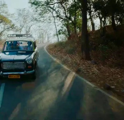 A wide shot of the taxi from the Bullet Echo commercial, setting the scene for the humorous journey.