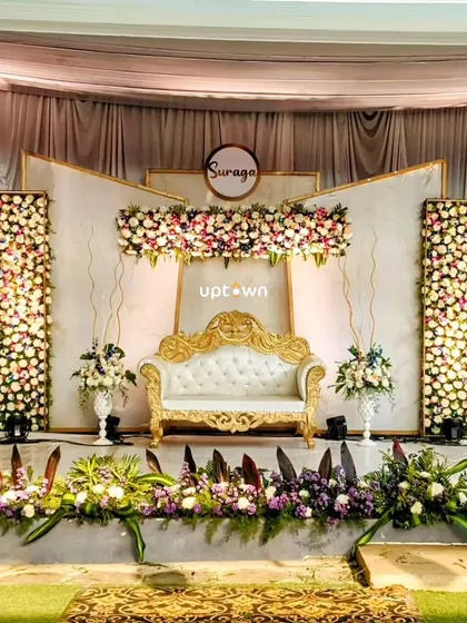 A beautiful floral stage for a formal event.