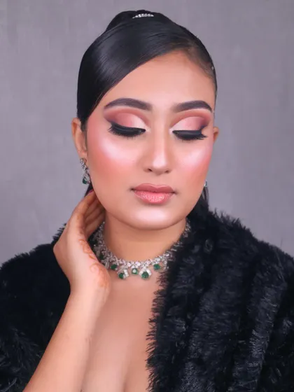 Hello Gorgeous. A beautiful glam look created by one of our talented students, featuring a soft pink smokey eye and glowing skin.
