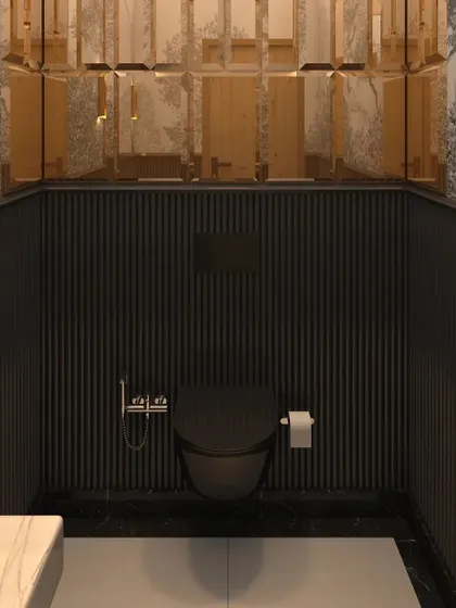 The lower half of the walls features modern black paneling, while the upper section has reflective gold accents for an opulent feel.
