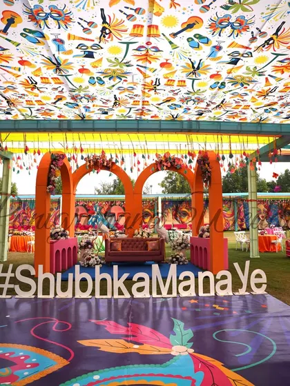 The full stage with the couple's custom hashtag, ready for a day of fun and festivities.