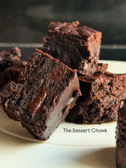 A stack of my classic chocolate brownie bites. They are perfect for sharing or for enjoying one by one whenever you need a sweet treat.