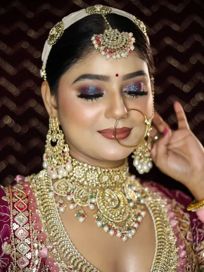 A demonstration of a rich, jewel-toned bridal look. Students learn to use bold colors on the eyes while keeping the rest of the face balanced and elegant.