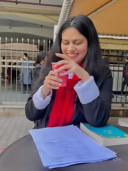 A brief pause with a coffee while going through legal papers. The life of a lawyer involves long hours of reading and analysis, but it is this dedication that lays the groundwork for success in court.