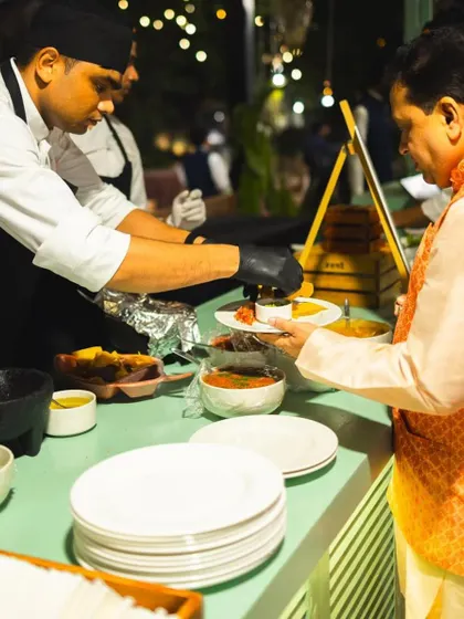 A guest enjoys the interactive experience at our fresh guacamole and salsa bar.