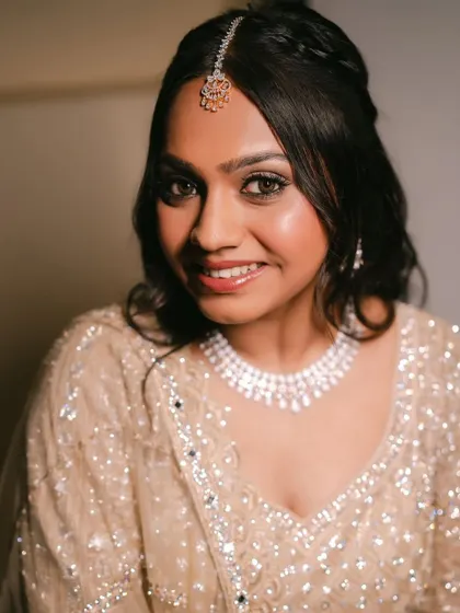 A close up portrait of Krisha. We did a soft smokey eye with a clean, radiant base for her engagement.