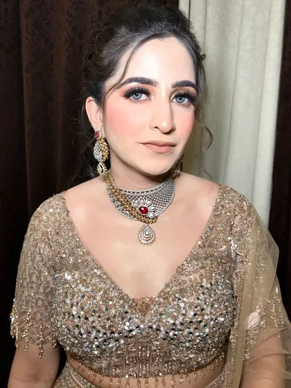 Oh-so-gorgeous party makeup. This look, inspired by Leena Bhushan, features dramatic eyes and a glowing base, perfect for a wedding reception or cocktail party.