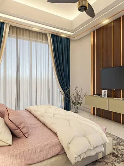 This angle highlights the functional aspects of the bedroom, including the minimalist TV unit mounted on a wood-paneled wall. The design ensures that technology is integrated without disrupting the room's serene and stylish aesthetic.