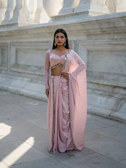 Part of our Pastel Pink Edit, this pre-stitched dhoti saree is modern, elegant, and easy to wear.