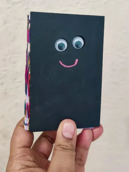 Even a simple book can become special with a custom cover. This one has googly eyes for a touch of fun.