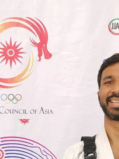 A portrait of our instructor during the Asian Games journey. This level of achievement inspires our entire community to aim higher.