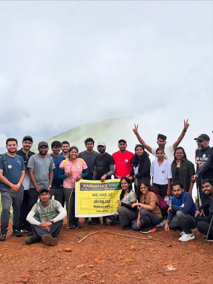Our group proudly holding the Karnataka Hikes banner at the Netravathi summit.