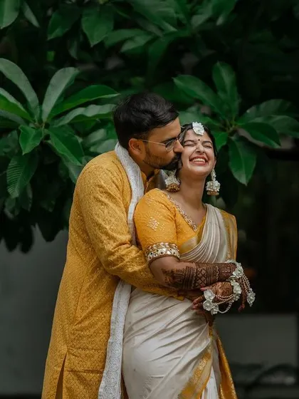 The pure joy of starting a new life together. This candid moment of laughter and love between Alankrita and Sanjith perfectly captures the happiness of their wedding day at Panchavati Pavilion.