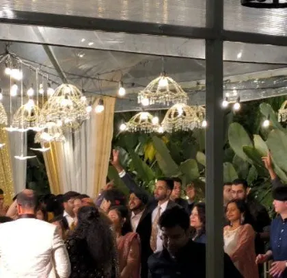 A wide shot of the beautifully decorated wedding venue.