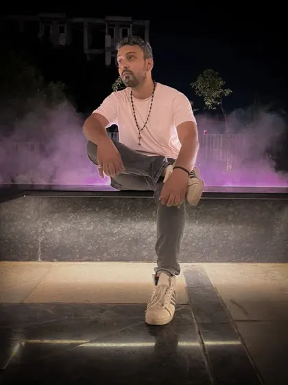 A full-body shot with some dramatic purple smoke. I like to experiment with practical effects to create unique portraits.