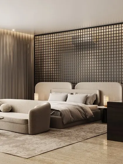 A master bedroom design featuring a striking black lattice screen behind the bed. The room includes a comfortable chaise lounge at the foot of the bed for added relaxation.