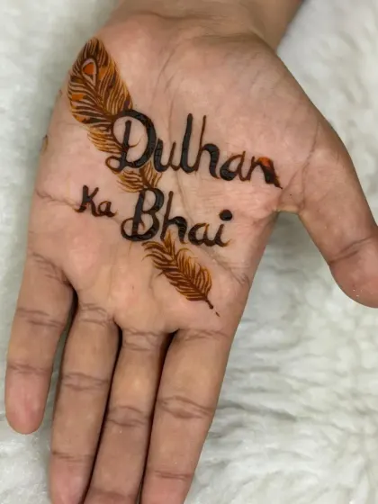 A fun and personal design for the "Dulhan ka Bhai" (bride's brother). The text is framed by two feathers, making it a proud and stylish statement piece for a key member of the family.