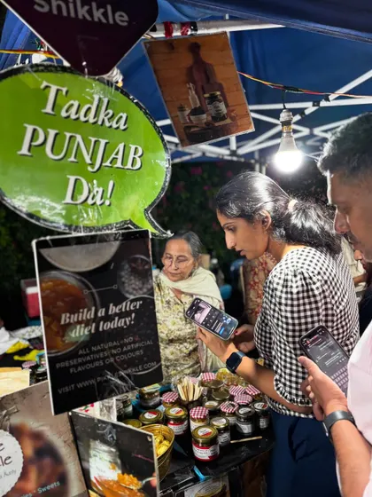 People often stop to take a look at our menu and the different flavours we offer. Our "Tadka Punjab Da" sign always gets attention.
