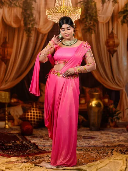 A graceful pose showing the full effect of the pre-draped saree and embellished belt. We style our outfits for both beauty and ease of movement during your photoshoot.