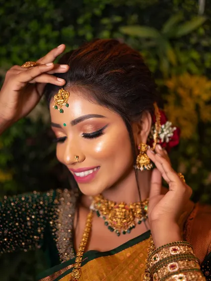 A happy bride is the best reward. This shot captures the radiant glow and confidence that a perfect bridal makeover can bring.