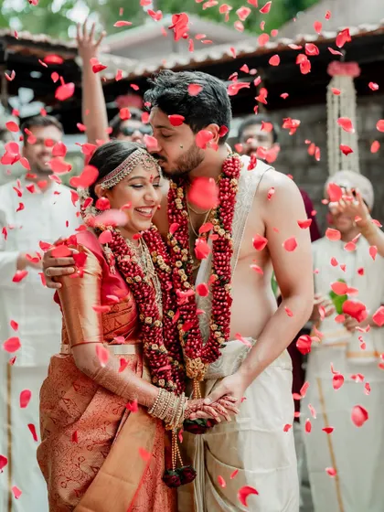 A moment of quiet connection amidst the grandeur of The Tamarind Tree. We love using the venue's stunning architecture to frame our couples, creating a story of romance and tradition.