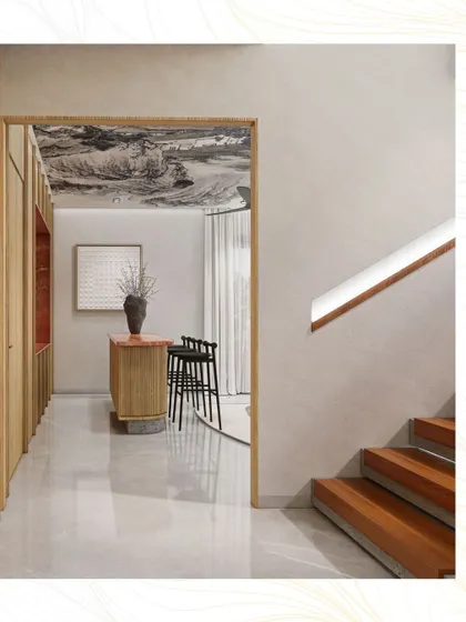 A view from the hallway into the living area, framed by a wood-lined doorway, creating a sense of transition and discovery.
