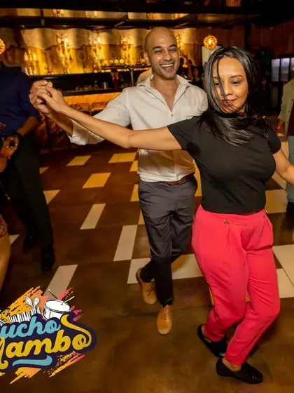 A happy pair gliding across the floor. We ensure a good balance of leads and follows, so everyone gets plenty of chances to dance the night away.