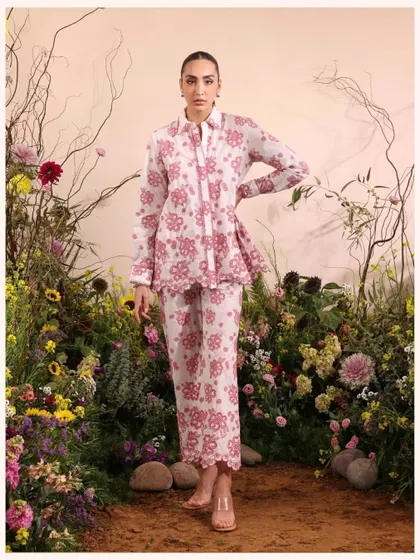 A beautiful pink and white floral co-ord set, perfect for a brunch date. The scalloped hem adds a playful, feminine detail.