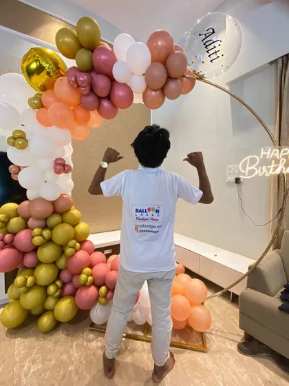 Teamwork makes the dream work. A proud moment for our decorator after completing a complex and beautiful organic balloon arch for a birthday celebration at home.