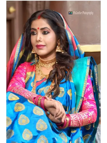 A beautiful candid-style shot of the actress, capturing a moment of thought during the photoshoot.