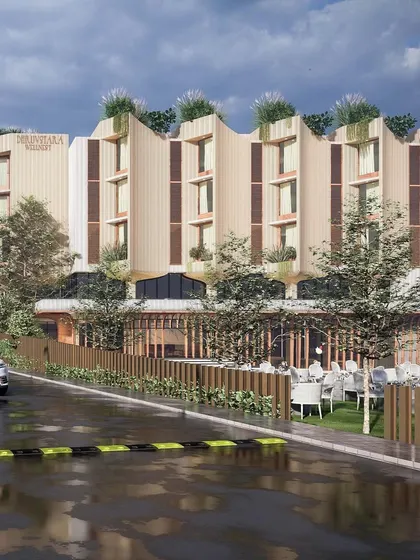 The street-side view of our Bellevue Club design. The facade features curved, vertical fins that provide solar shading and create a unique architectural identity, while the ground floor opens up to an outdoor cafe seating area.