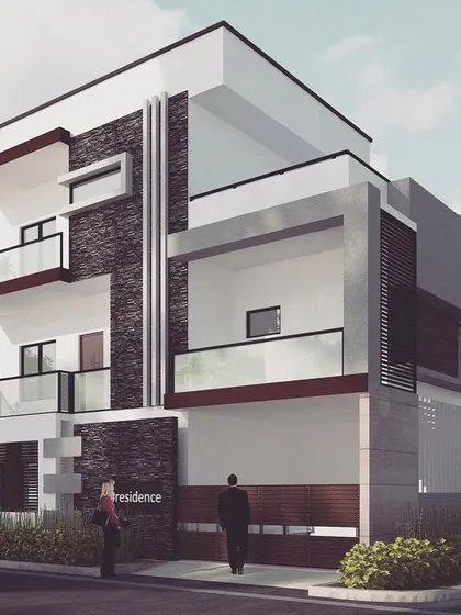 A residence in Hormavu featuring a bold facade with dark stone cladding that runs vertically up the building. This creates a strong visual anchor, contrasted with white walls and cantilevered balconies.