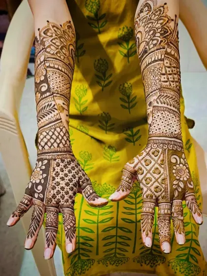 A full view of a beautiful back-of-hand design with mixed floral and geometric patterns.