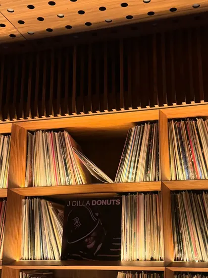 Digging for gems. A shot from a record store, surrounded by vinyl. The hunt for new and old music is a never-ending passion.