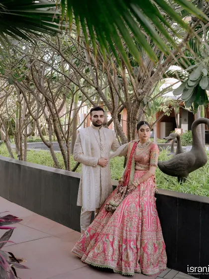 A stylish portrait of the couple at their destination wedding venue. We help scout the best locations for photos that are both beautiful and unique.