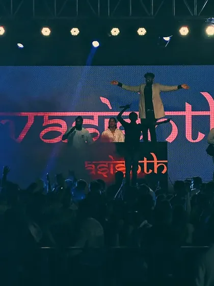 A triumphant "Titanic" pose on the DJ console. We always aim to create iconic, memorable moments.